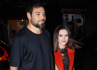 Ao lado do namorado, Sandy esbanja estilo do terninho vermelho Sandy e Pedro Andrade (Foto: Manu Scarpa/Brazil News)