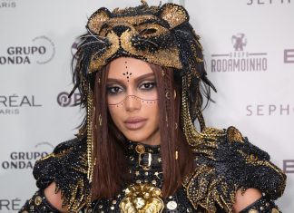 Com tatuagem apagada, Anitta se veste de Leão e Sagitário Anitta (Foto: Lucas Ramos/Brazil News)